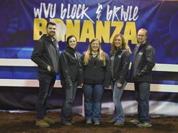 students standing in front of WVUBlock and Bridle Bonanza banner